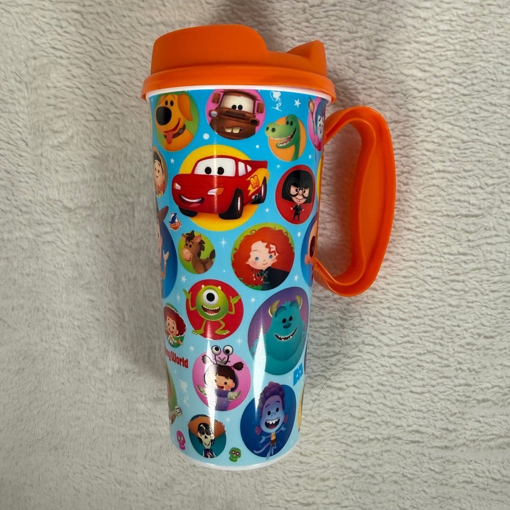 Disney World Resort Refillable Mug Pixar Jerrod Maruyama orange Souvenir 16oz
